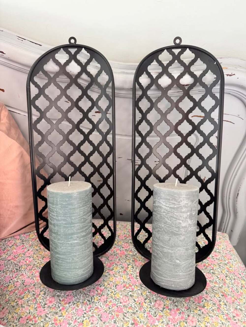 Pair of Black Metal Wall Candle Sconces and candles